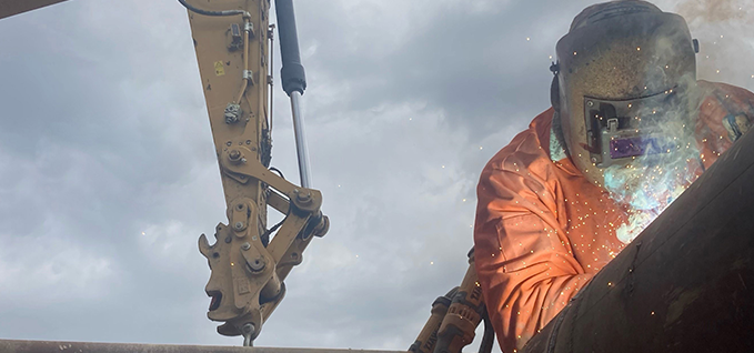 Welder working at a pipeline site